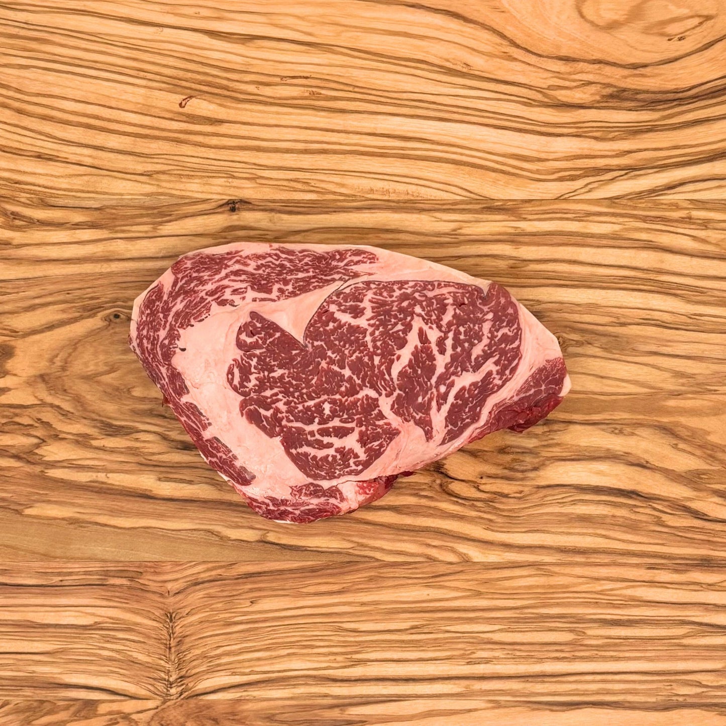 Hängmörad Reserva Entrecôte med marmorering, perfekt för grillning eller stekning.